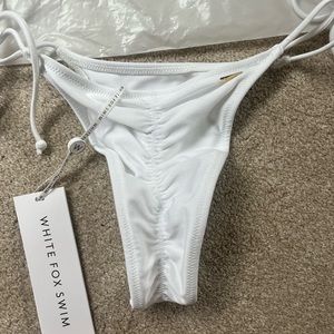 WHITE FOX SWIM